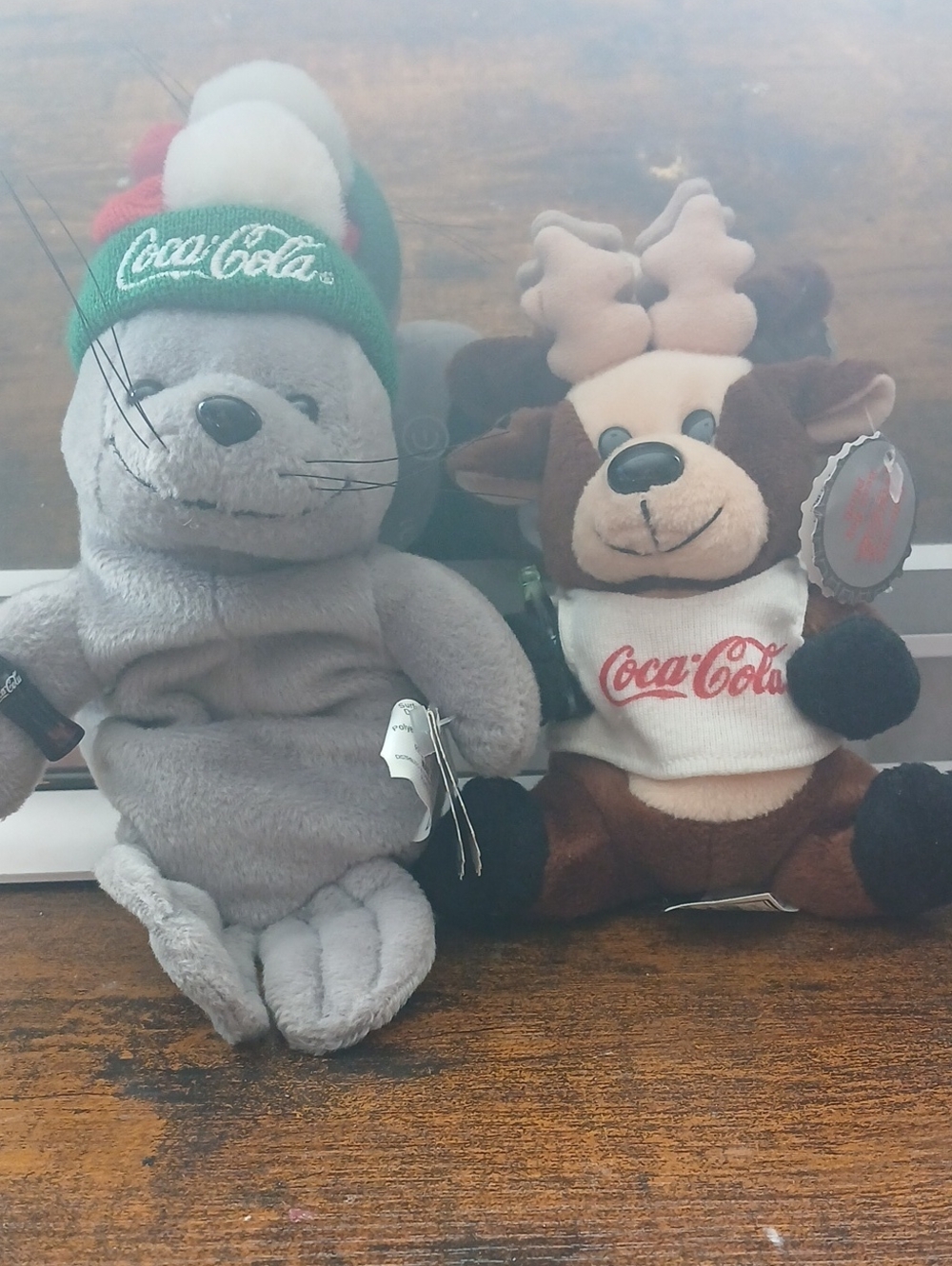 Coca Cola Gray Seal & Brown Reindeer Holiday Plush Pair